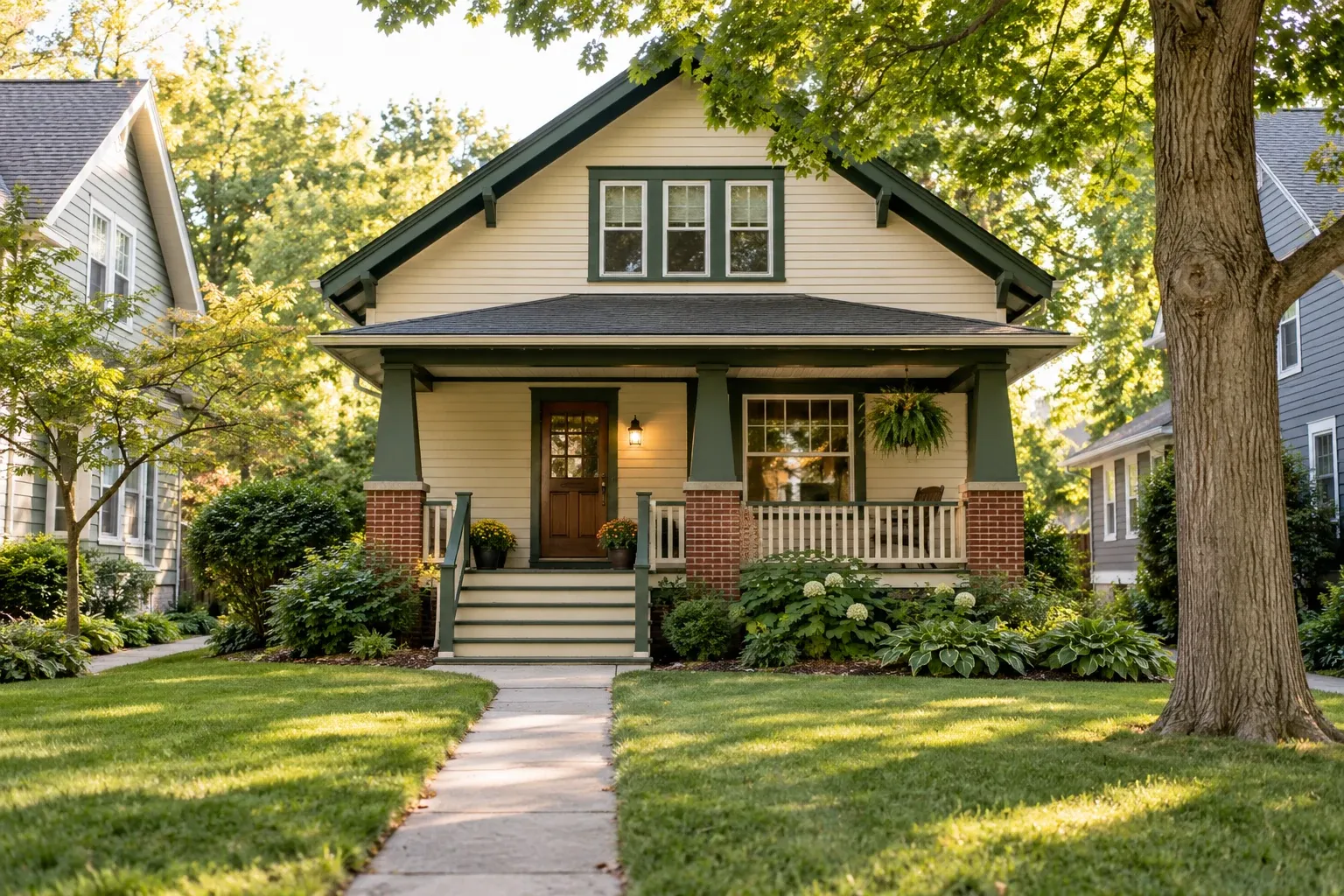 Residential home with a front porch and landscaped yard